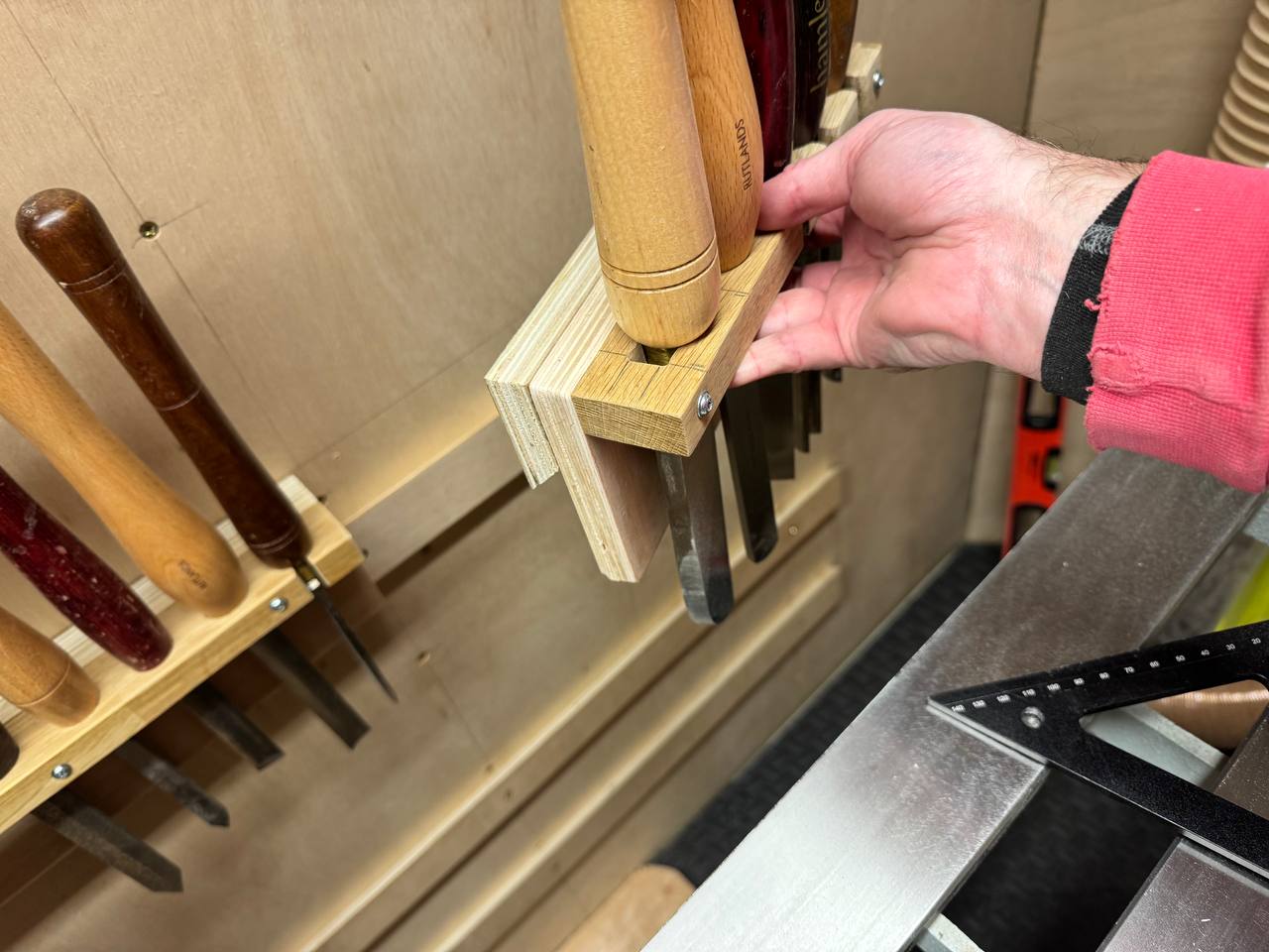 Custom cleat bracket holding a gouge